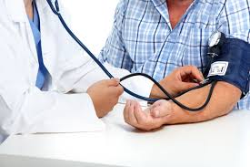 Doctor consulting patient about hypertension